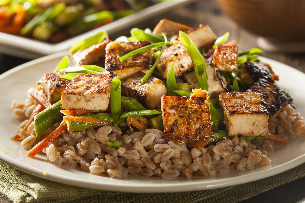 Stir-Fried Tofu with a Variety of Vegetables and a Side of Brown Rice